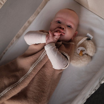 Geborduurde Merino wollen slaapzak newborn