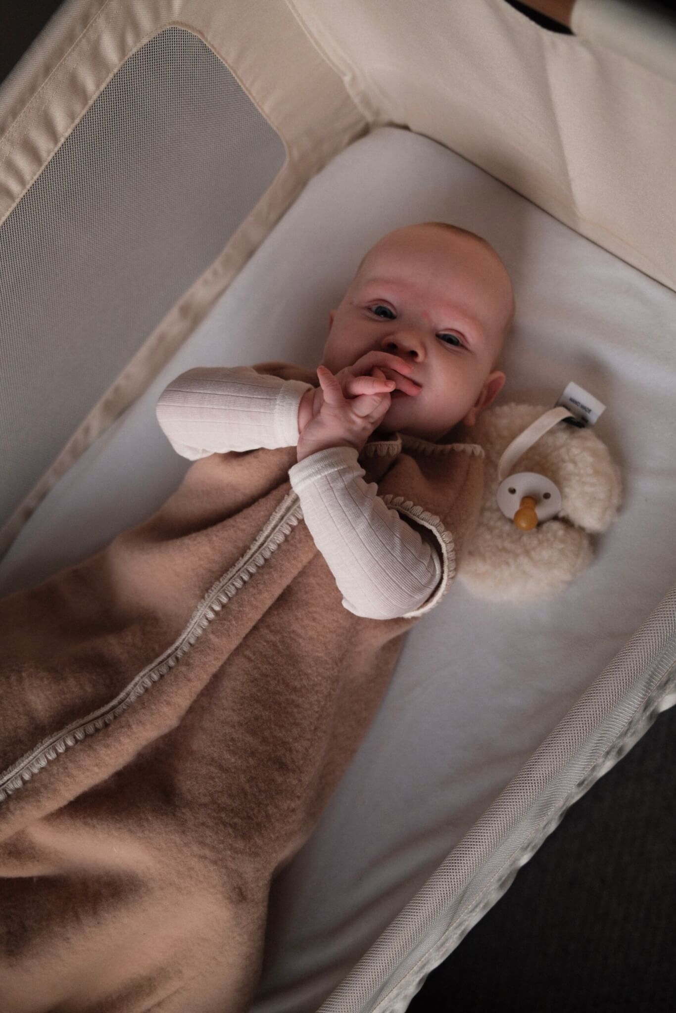 Geborduurde Merino wollen slaapzak newborn