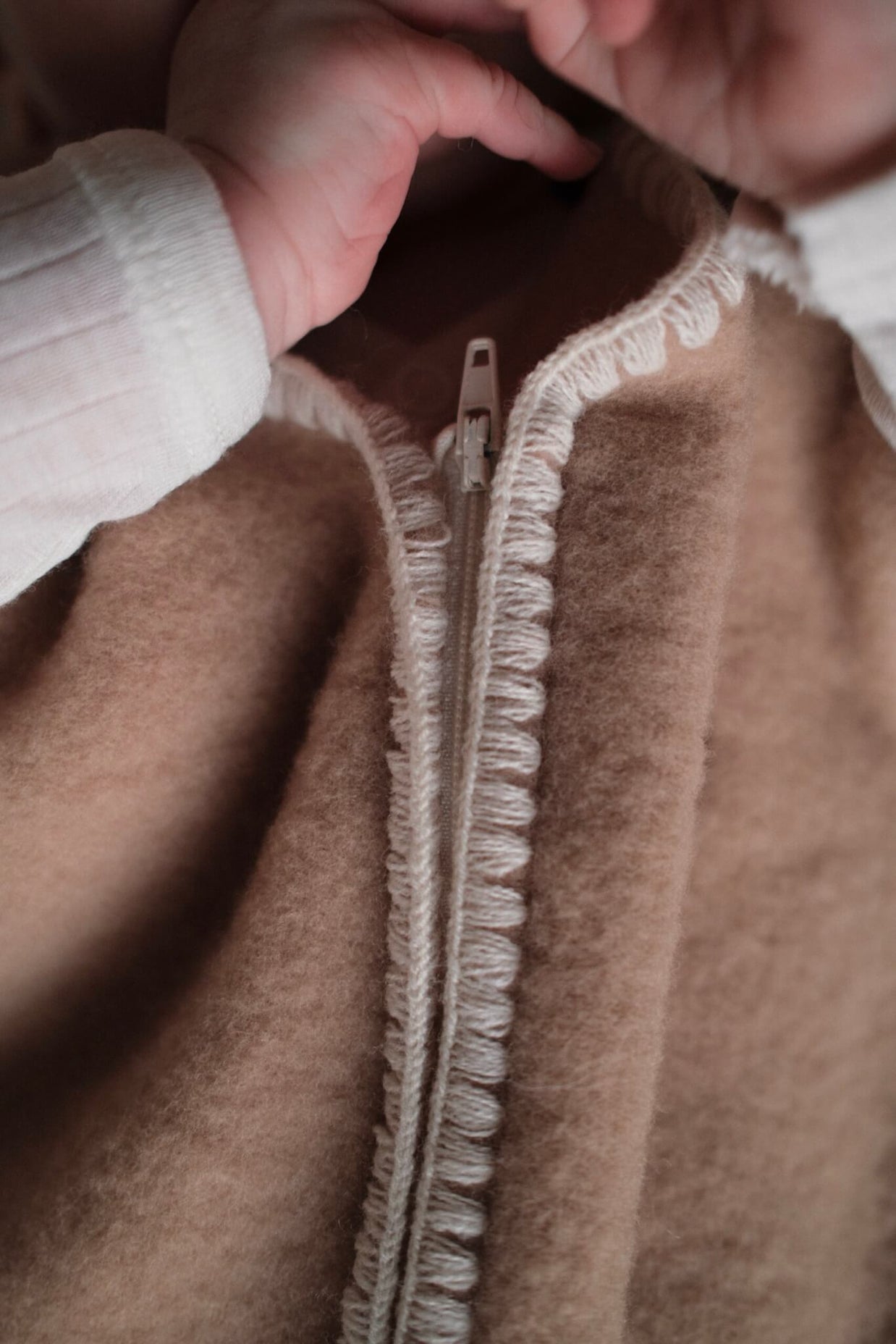 Geborduurde Merino wollen slaapzak newborn