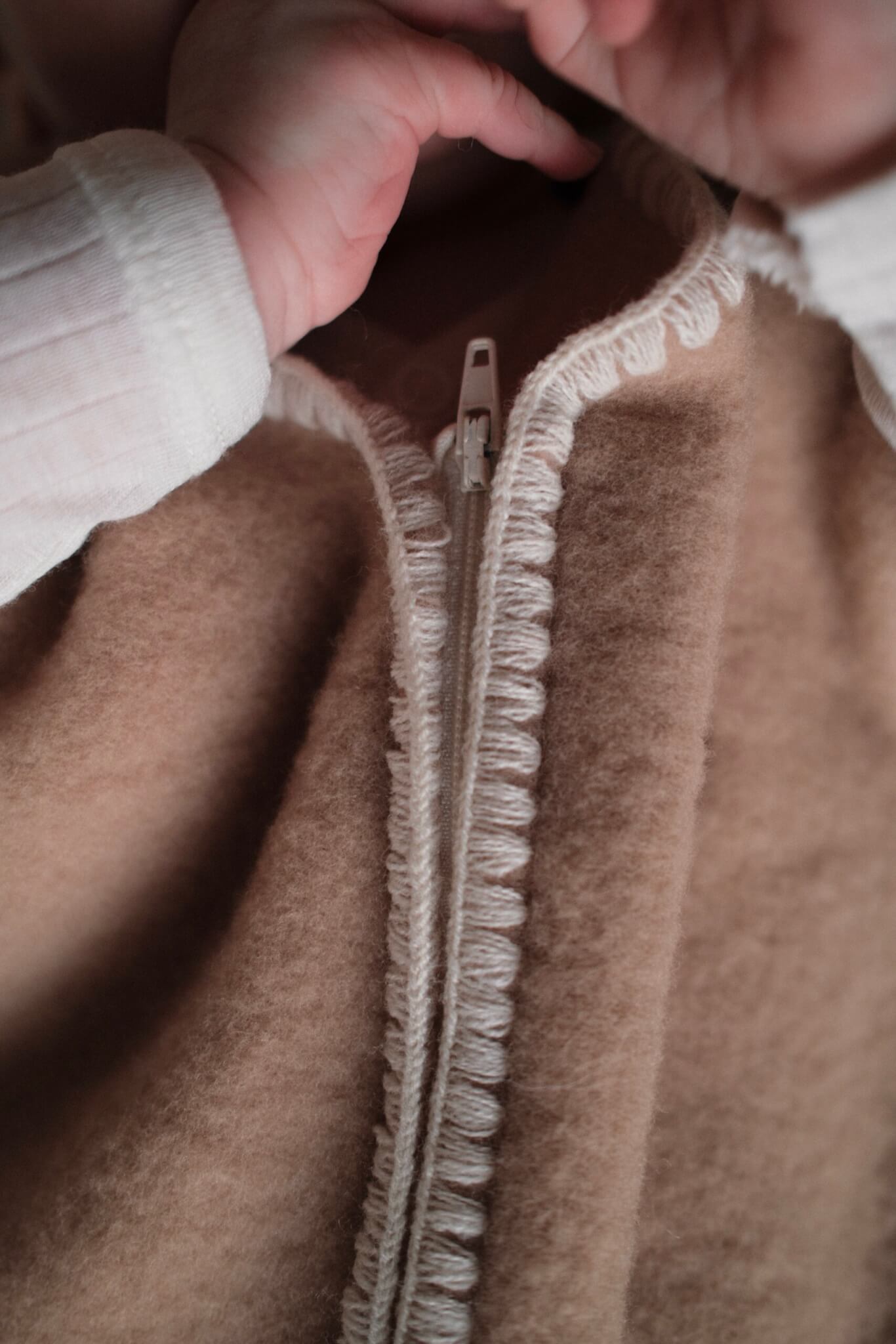 Geborduurde Merino wollen slaapzak newborn