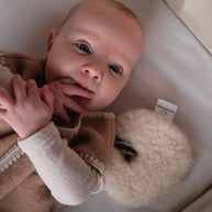 Geborduurde Merino wollen slaapzak newborn