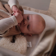 Geborduurde Merino wollen slaapzak newborn