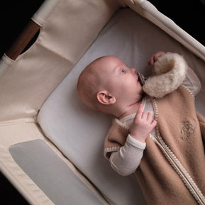 Geborduurde Merino wollen slaapzak newborn