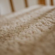 Merino wollen onderlegger ledikant