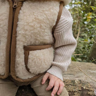 Merino wollen bodywarmer met capuchon kind