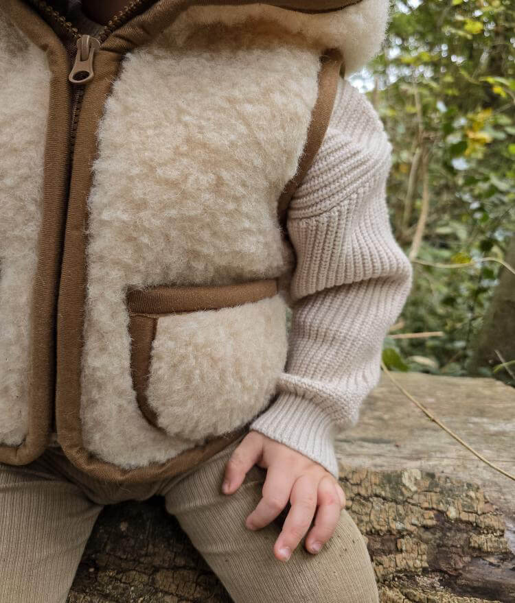 Merino wollen bodywarmer met capuchon kind