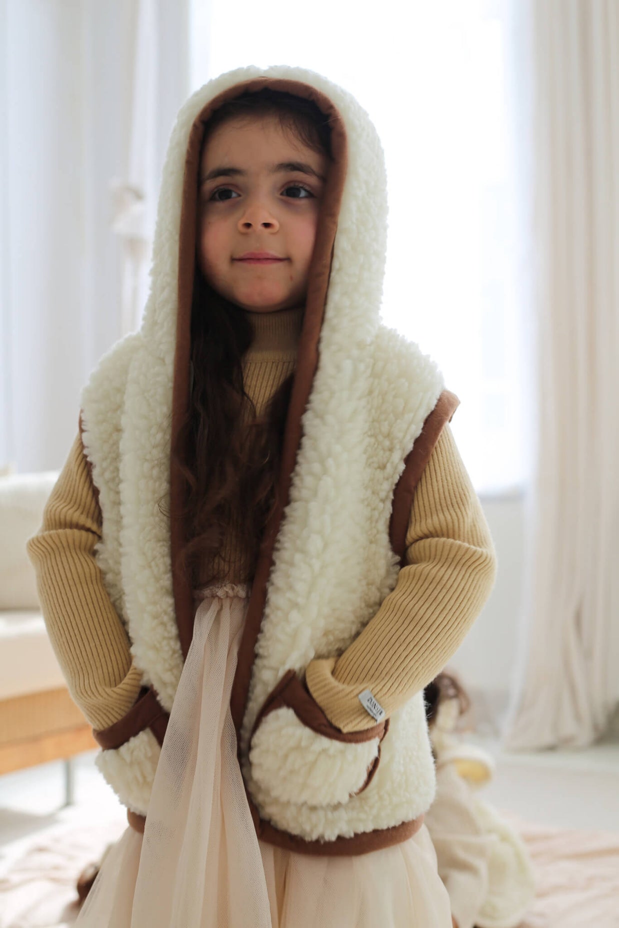 Merino wollen bodywarmer met capuchon kind - Beige met bruine rand