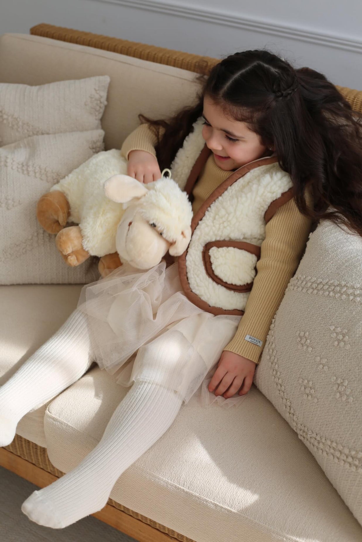 Merino wollen bodywarmer met capuchon kind - Beige met bruine rand