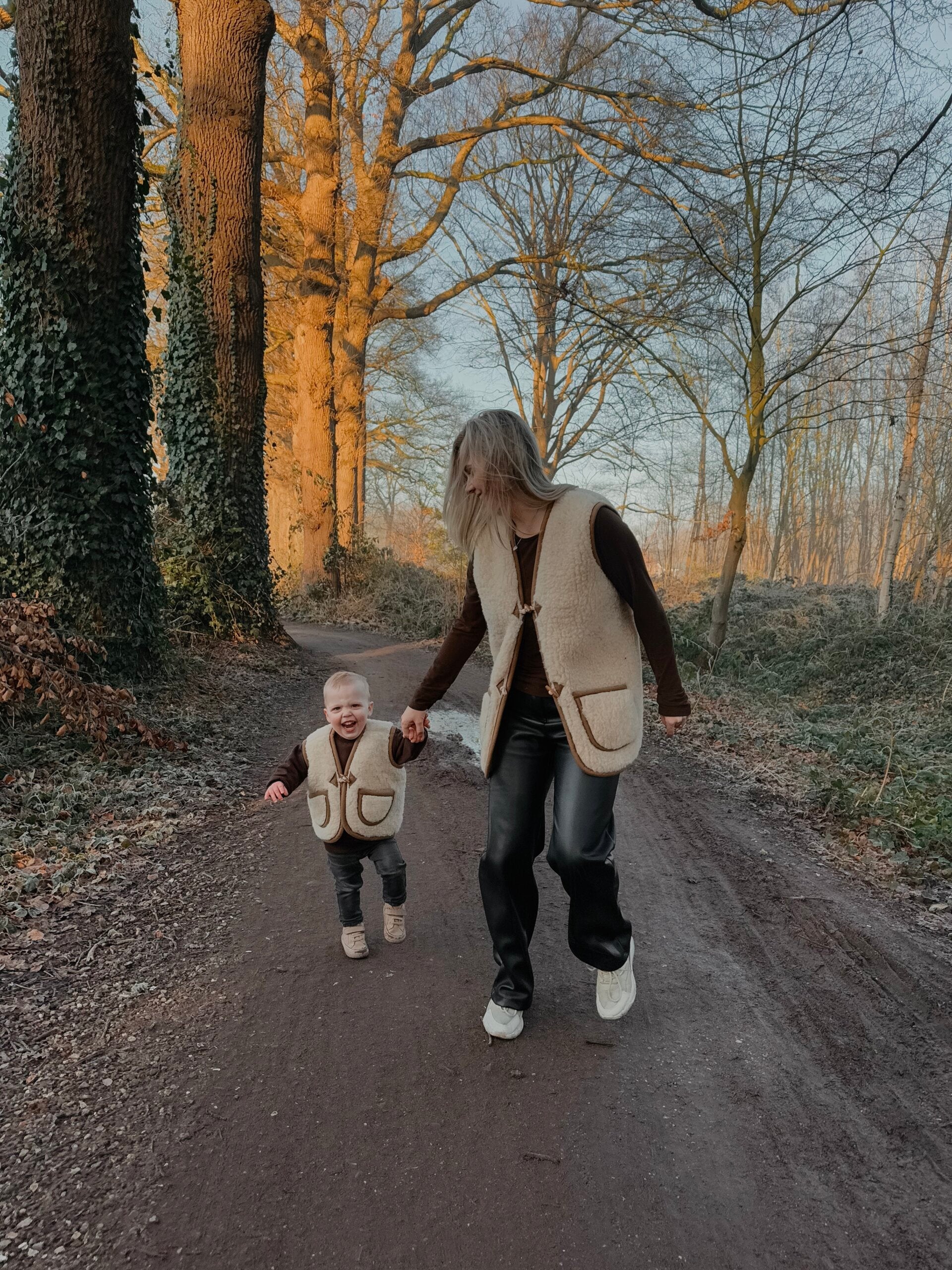 Merino wollen bodywarmer volwassenen met houten touwtjes