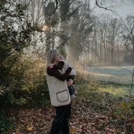 Merino wollen bodywarmer volwassenen met houten touwtjes