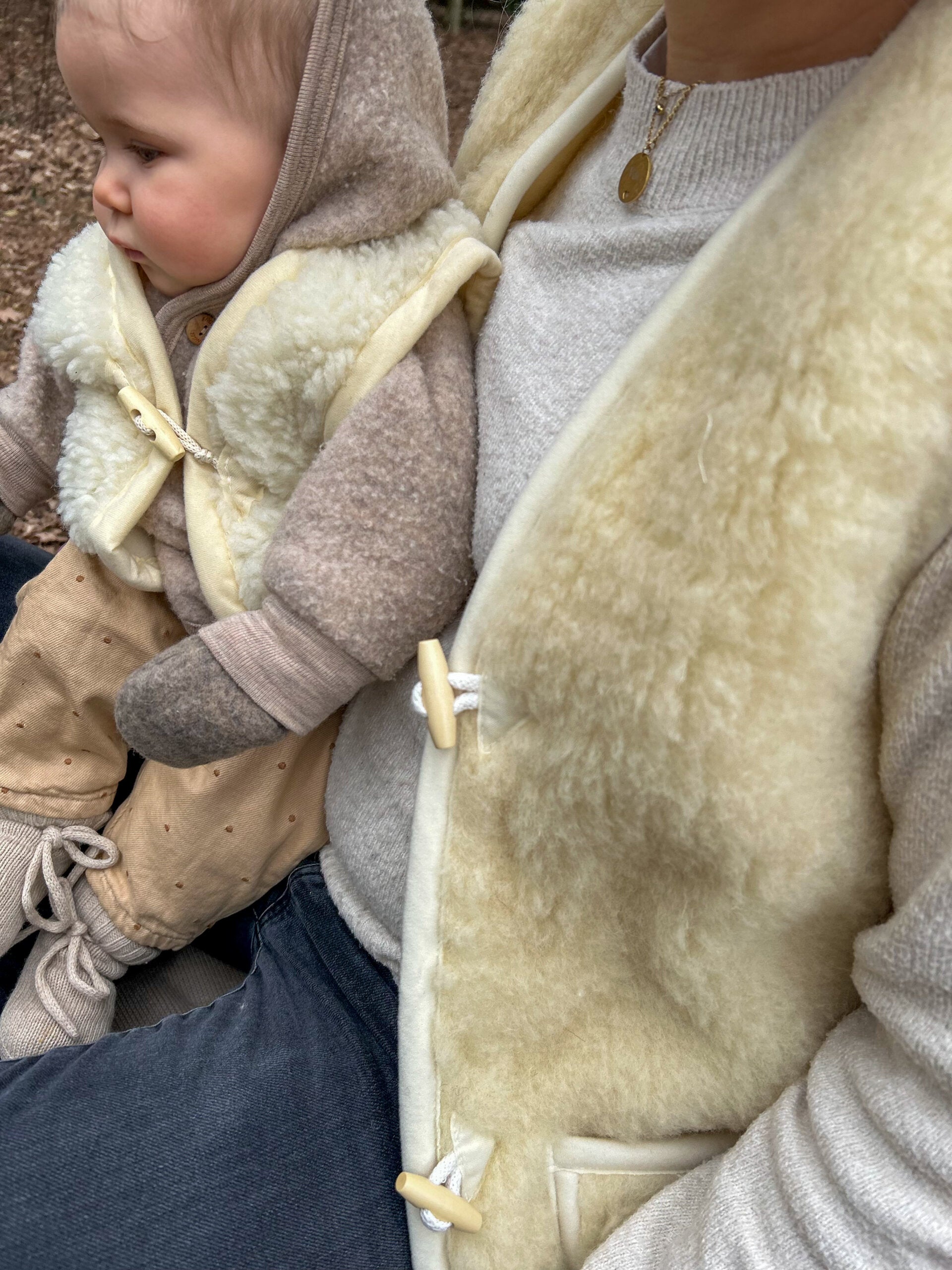 Merino wollen bodywarmer volwassenen met houten touwtjes