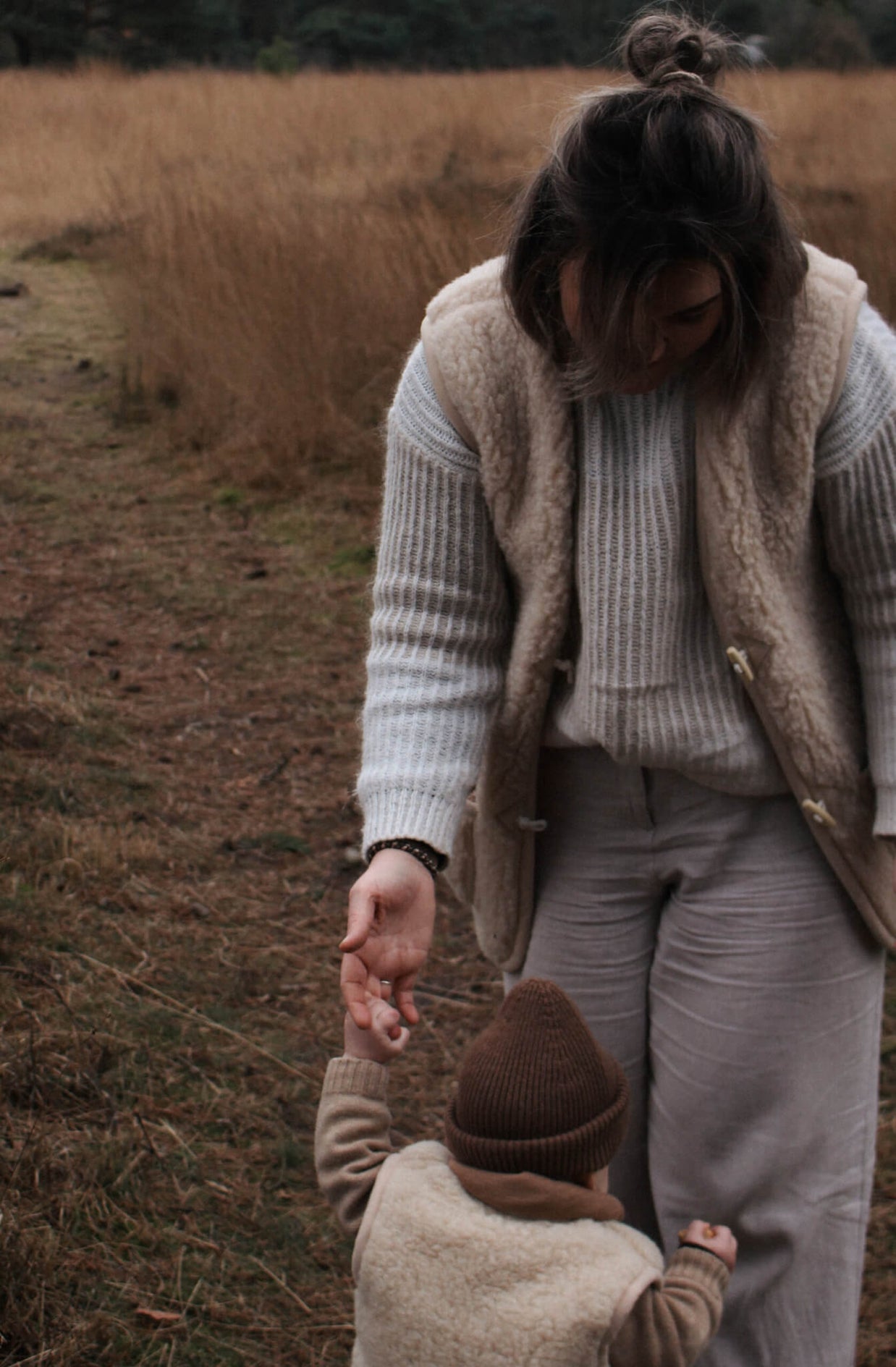 Merino wollen bodywarmer volwassenen met houten touwtjes