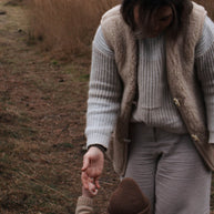 Merino wollen bodywarmer volwassenen met houten touwtjes