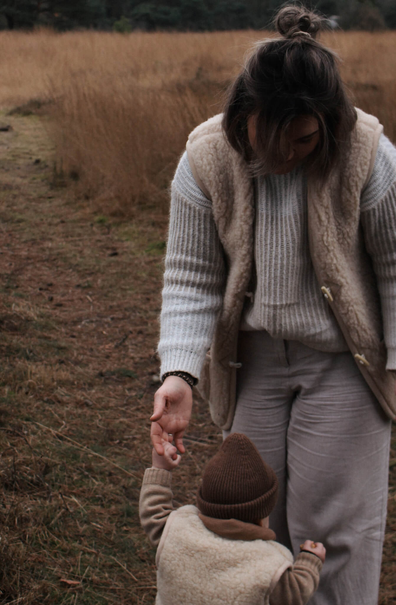 Merino wollen bodywarmer volwassenen met houten touwtjes