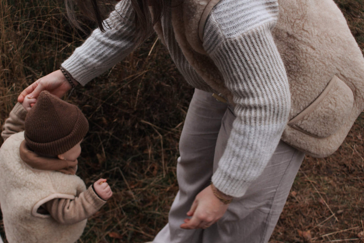 Merino wollen bodywarmer volwassenen met houten touwtjes