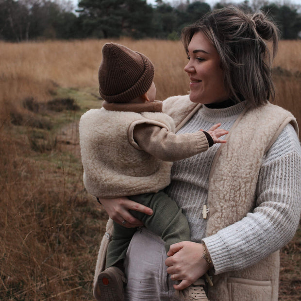 Merino wollen bodywarmer volwassenen met houten touwtjes