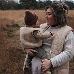 Merino wollen bodywarmer volwassenen met houten touwtjes