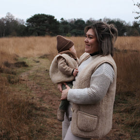 Merino wollen bodywarmer volwassenen met houten touwtjes