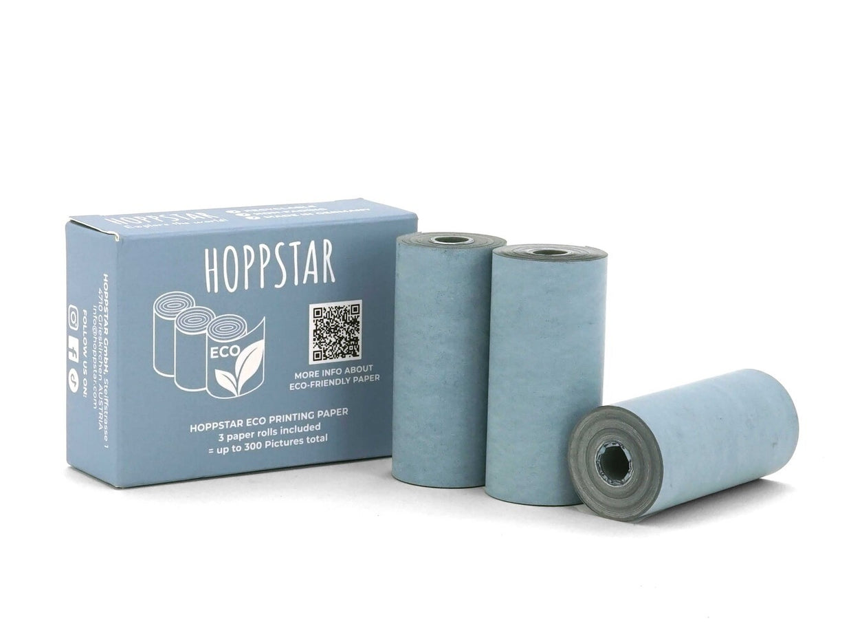 Hoppstar doos met drie lichtblauwe papierrollen voor de kindercamera Artist