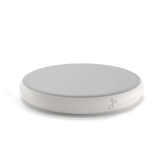 Ronde, grijze en witte schijf met minimalistisch ontwerp.