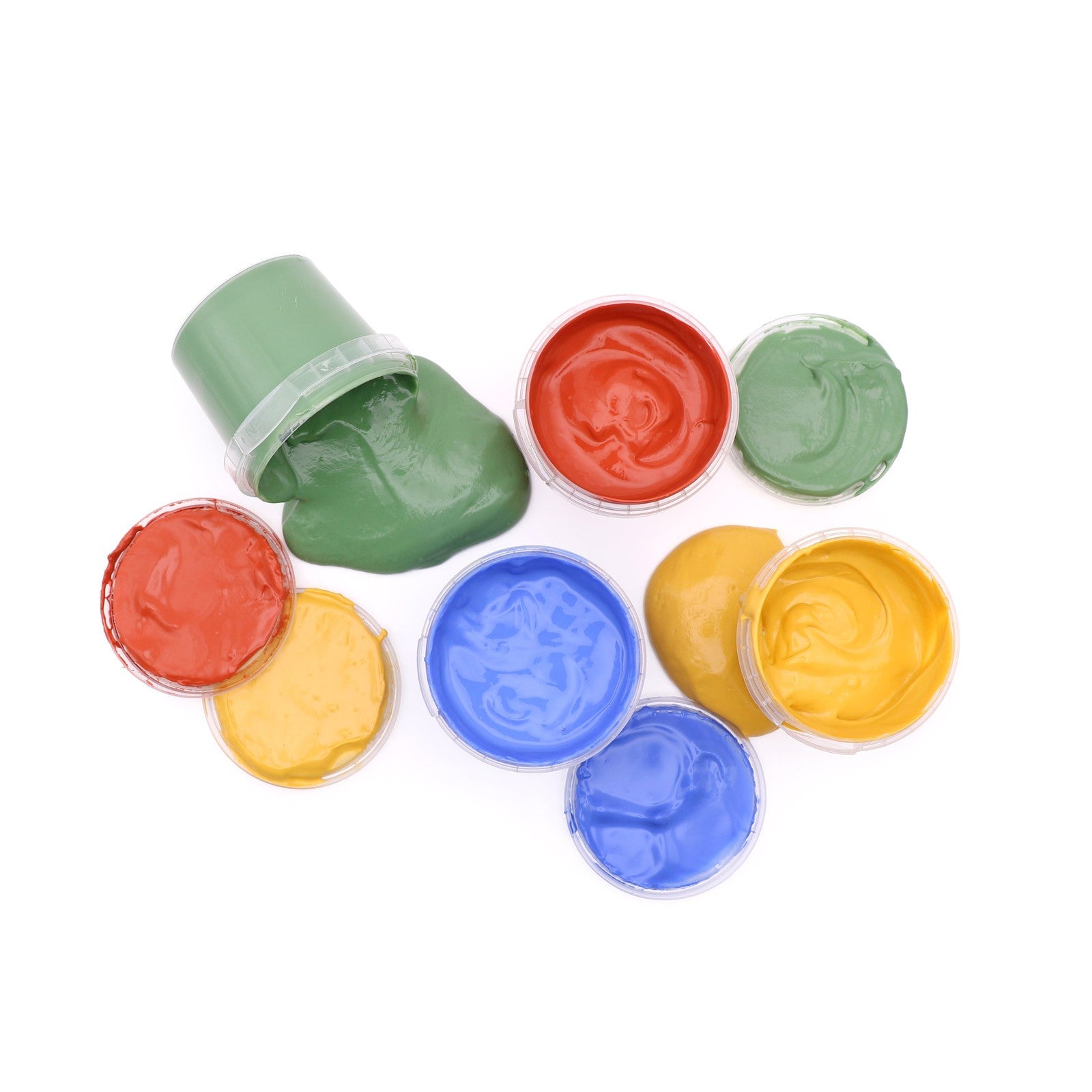 Open potjes biologische vingerverf in groen, rood, blauw en geel van bovenaf