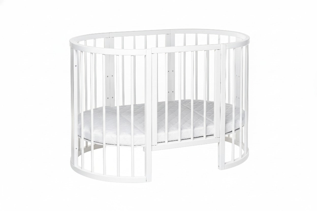 Ovaal babybed OLIN met matras en verlaagde zijwand