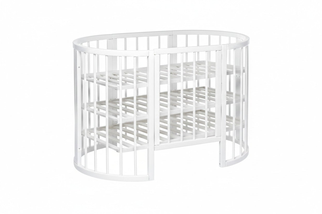 Babybed OLIN omgebouwd tot ovale opbergmeubel met drie planken