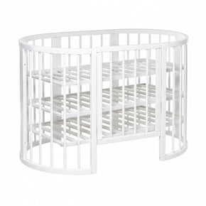 Babybed OLIN omgebouwd tot ovale opbergmeubel met drie planken